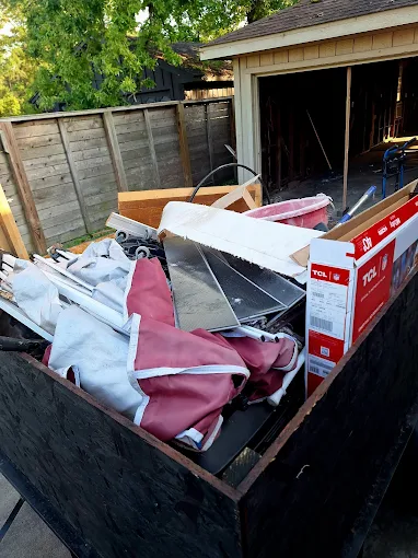 Full trailer with junk for eco-friendly disposal following Texas regulations and environmental laws